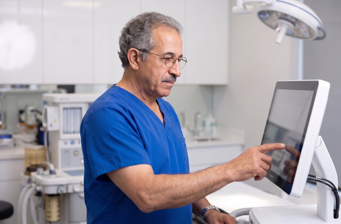 Dr Jassim Daood performing a procedure at the Bankstown clinic